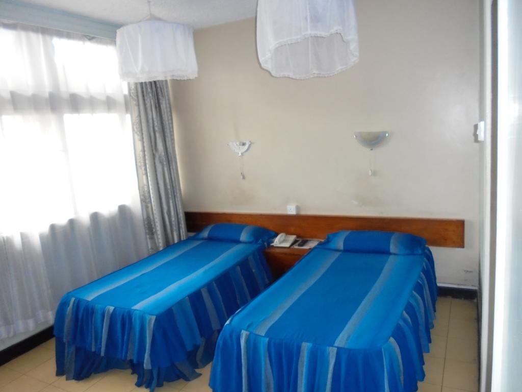 Karibu Hotel Найроби Номер фото