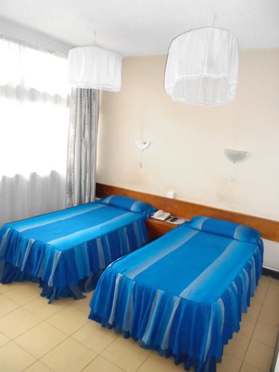 Karibu Hotel Найроби Номер фото